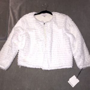 Faux fur 3/4 length sleeve jacket. Perfect condition never worn